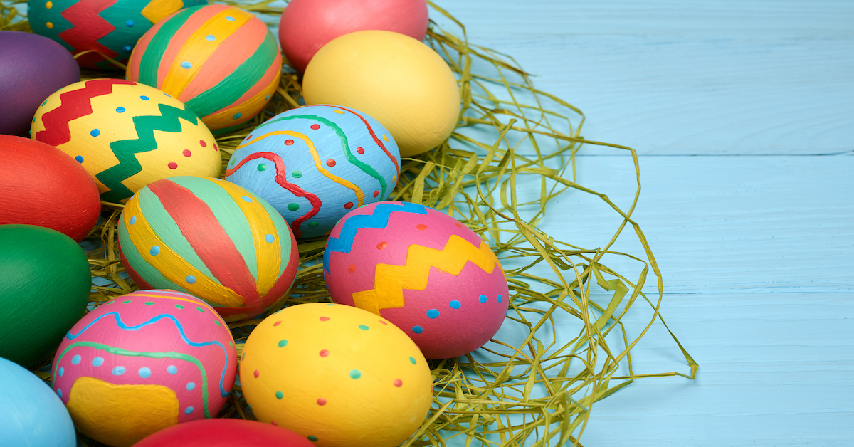 Easter eggs hand painted colorful, wood background huevos de pascua