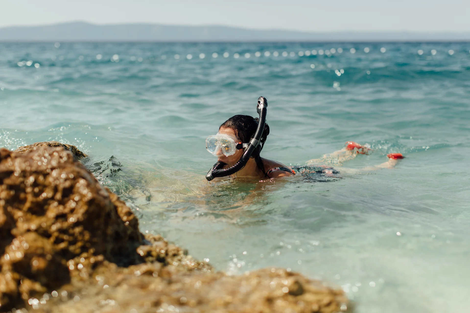 chica-buceando-en-playa-paradisiaca Buceo en Punta Cana